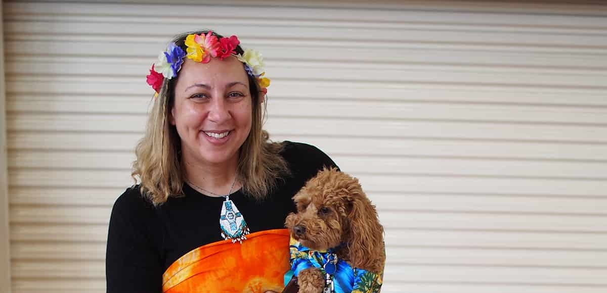 Head of Malvern Campus Simone Reilly holding her therapy dog Monty