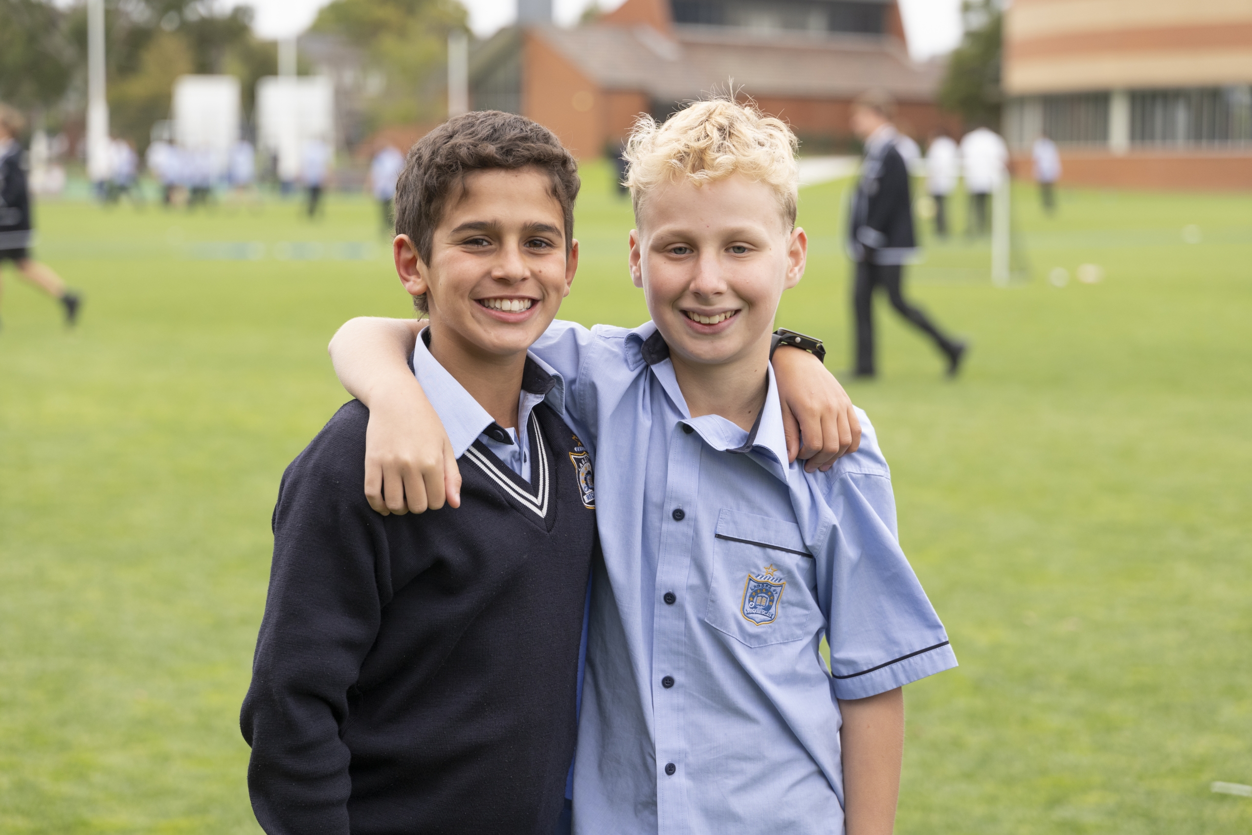 Middle school students on a grass field