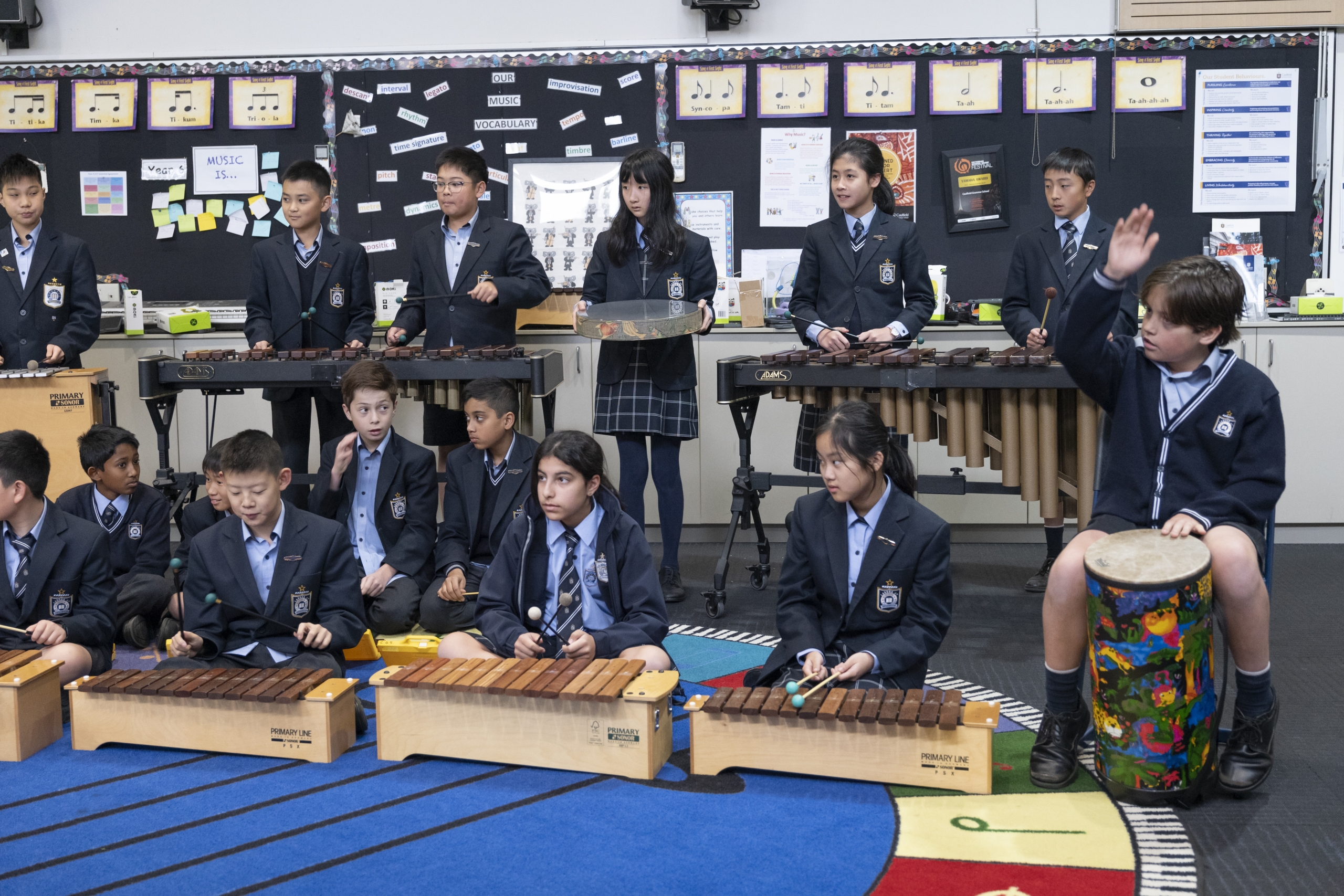 Caulfield Grammar School middle school students learning music