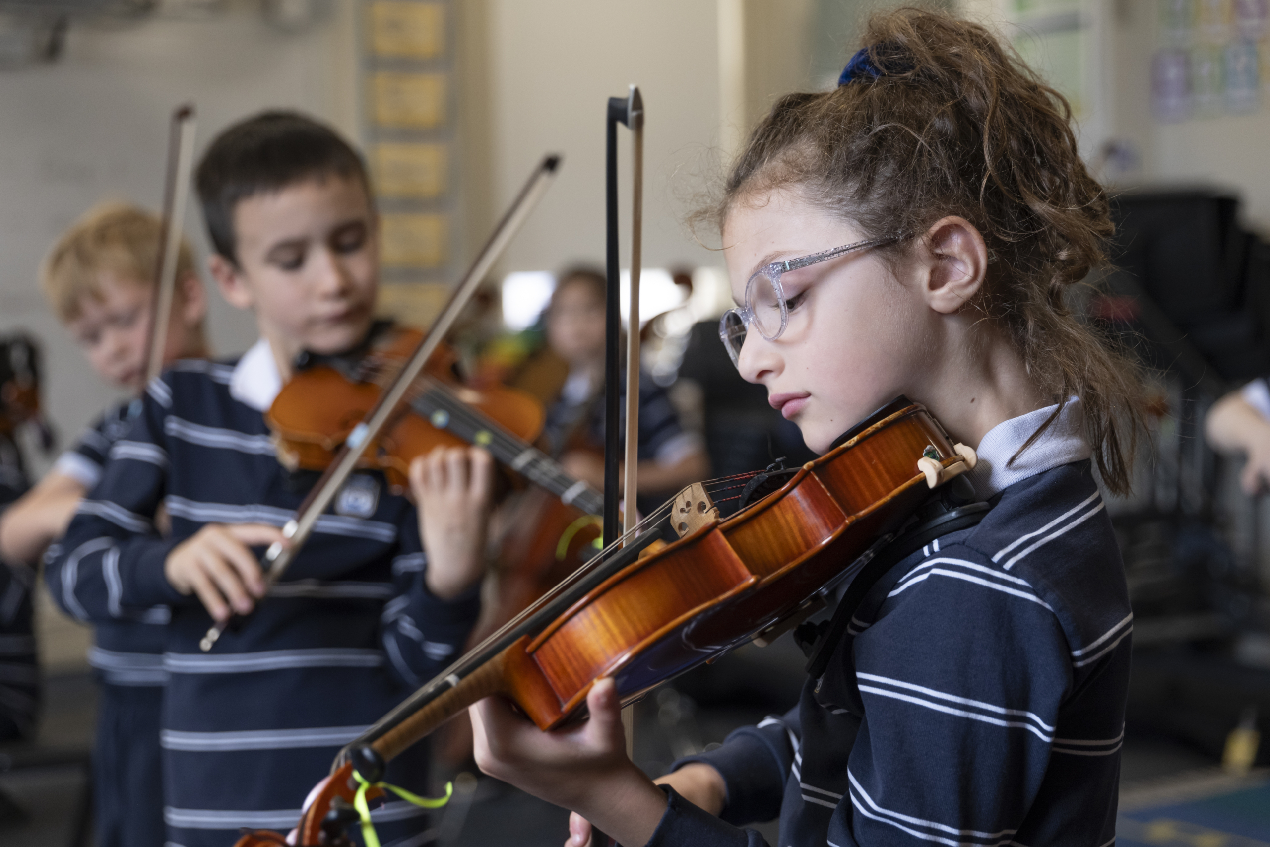 Students playing violin